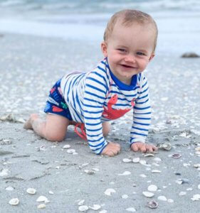baby plays on sanibel beach 1