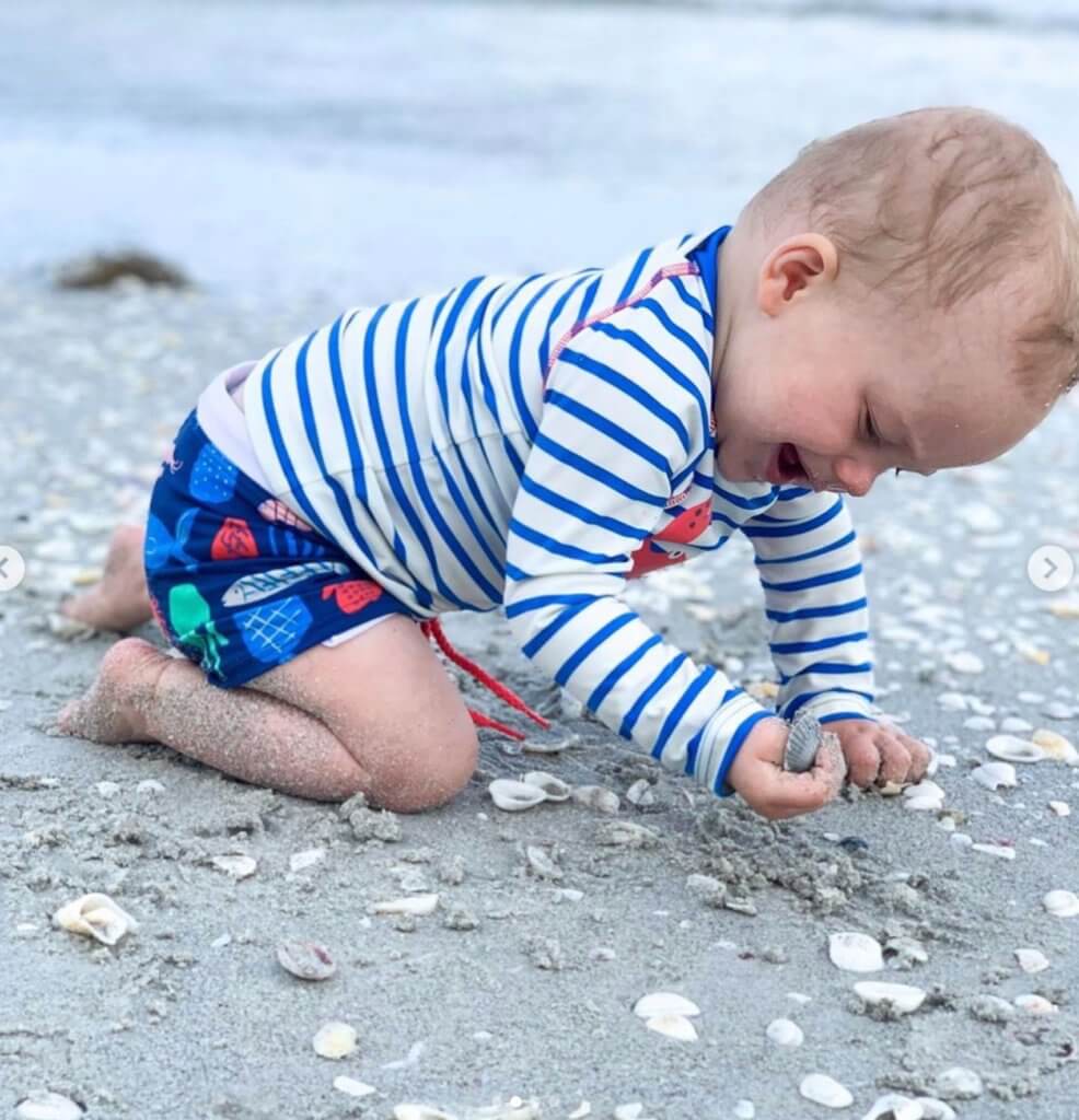 baby plays on sanibel beach 2