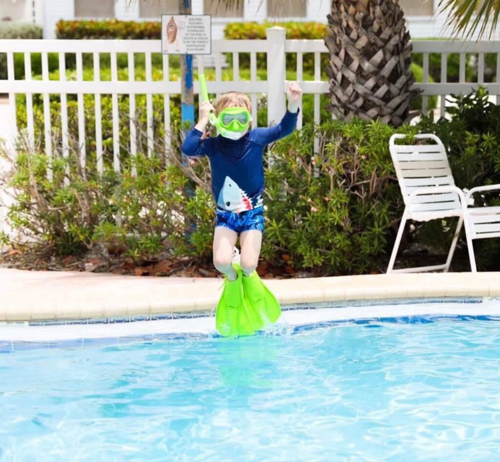 jumping in pool on sanibel