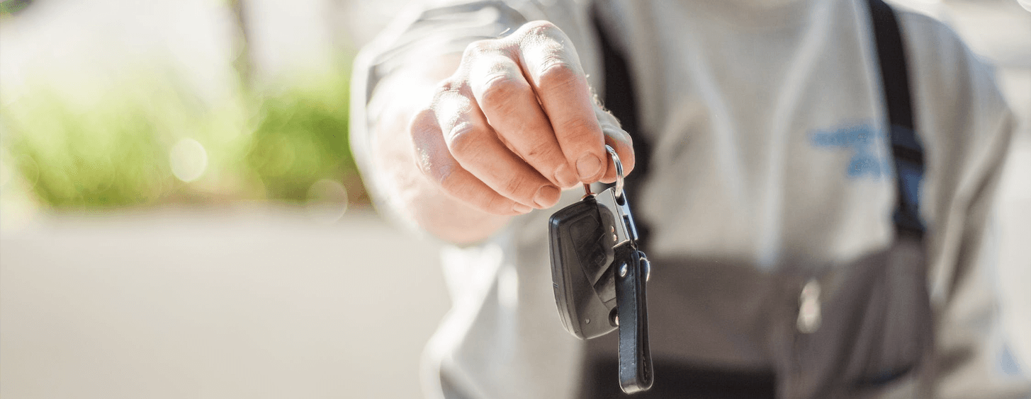 Screen-Shot-2021-08-05-at-9.59.26-AM Image of a person holding a key